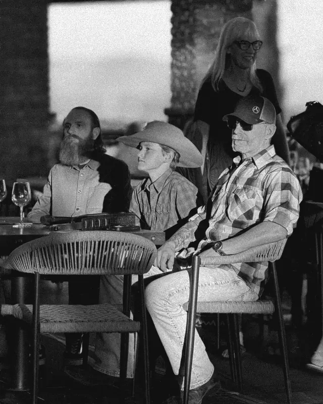 Open mic audience watching a performance at Miramonte Winery, in black and white