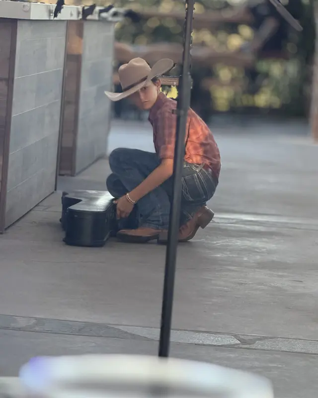 Performer getting set up before an open mic set